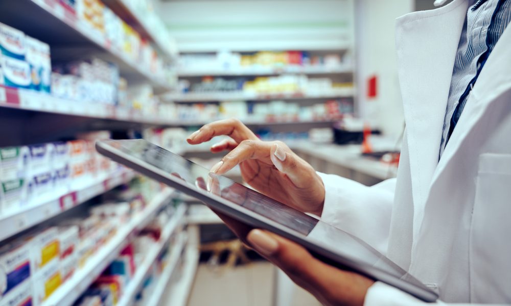 Closeup,Of,Hands,Of,Young,Female,Pharmacist,Checking,Inventory,In